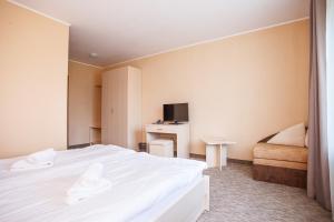 Postel nebo postele na pokoji v ubytování Skilandhouse Yablunytsya + 31 fotografií