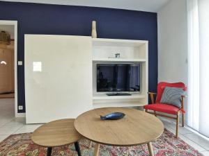 TV a/nebo společenská místnost v ubytování Gîte de Kerninon Maison spacieuse et lumineuse