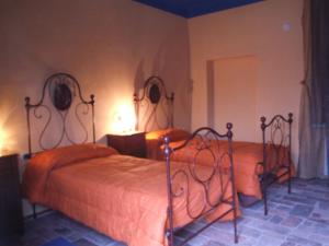 Letto o letti in una camera di B&B Coco Loco