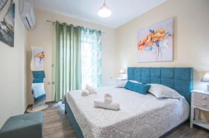 Posteľ alebo postele v izbe v ubytovaní Tina's Suite by "elite"