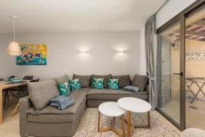 Ein Sitzbereich in der Unterkunft MEDANO4YOU The Ocean House