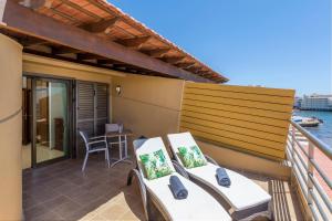 Ein Balkon oder eine Terrasse in der Unterkunft MEDANO4YOU The Ocean House