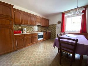 Kuchyňa alebo kuchynka v ubytovaní Saskia Residence
