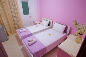 Ένα ή περισσότερα κρεβάτια σε δωμάτιο στο Vila Klevis