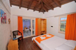 Postel nebo postele na pokoji v ubytování Cesme Elysium Hotel
