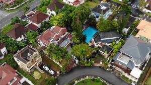 a model of a suburb with houses and a pool at Seremban Grande Villa 163 by Vale Pine in Seremban