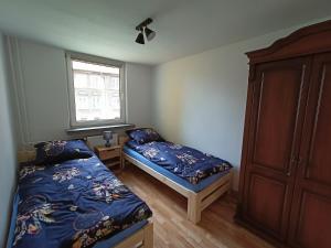Posteľ alebo postele v izbe v ubytovaní Udane Wczasy