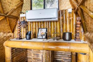 A television and/or entertainment centre at Vagatorian - Stylish Luxury Designer Cottages