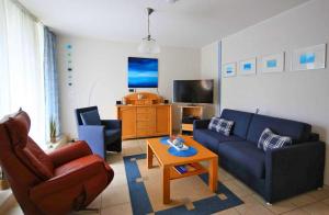 TV a/nebo společenská místnost v ubytování Ferienwohnung "Zum Hafen" Objekt ID 12136-0