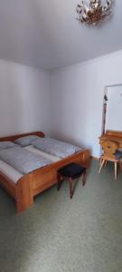 Postel nebo postele na pokoji v ubytování Gästehaus Moorbad Gmös
