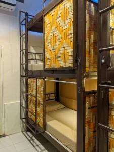 Postel nebo postele na pokoji v ubytování Cebu Pungko-pungko Hostel