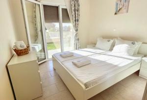 Postel nebo postele na pokoji v ubytování Mango apartment