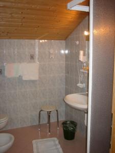 Phòng tắm tại Garni Sonnegg
