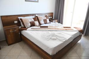 Een bed of bedden in een kamer bij Vila Oxinn