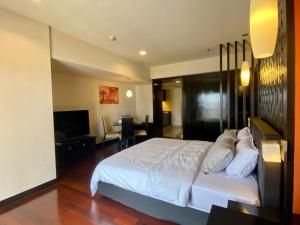 Suite @ Sunway Pyramid Mall客房内的一张或多张床位