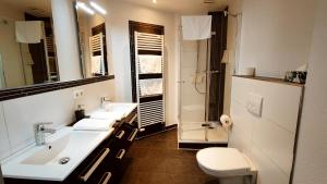 Ein Badezimmer in der Unterkunft Pension Glückstadt