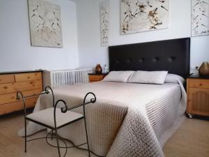 Łóżko lub łóżka w pokoju w obiekcie Casanosa