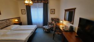 Postel nebo postele na pokoji v ubytování Hotel Excellent