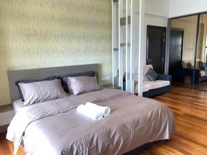 Suite @ Sunway Pyramid Mall客房内的一张或多张床位