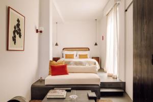 Кровать или кровати в номере White Exclusive Suites & Villas