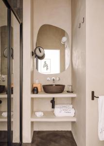Ванная комната в White Exclusive Suites & Villas