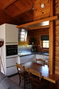 Η κουζίνα ή μικρή κουζίνα στο De Genten 1, vakantiewoning met jacuzzi +15 φωτογραφίες