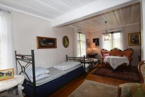 Un ou plusieurs lits dans un hébergement de l'établissement Idyllic holiday house in Sundshult