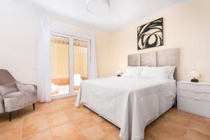 Posteľ alebo postele v izbe v ubytovaní Home2Book Stunning Sultan Casa Estrella, Wifi&Pool + 35 fotografií