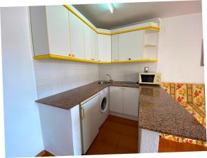 A kitchen or kitchenette at Apartamentos Decathlon