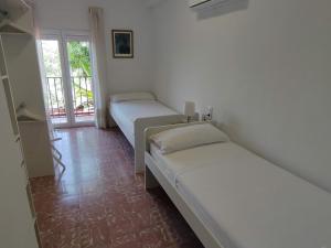 Posteľ alebo postele v izbe v ubytovaní Almona junto al río - Kainga Homes