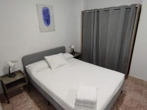 Posteľ alebo postele v izbe v ubytovaní Almona junto al río - Kainga Homes