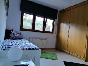 Łóżko lub łóżka w pokoju w obiekcie Casanosa