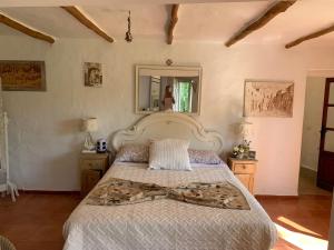 A bed or beds in a room at Finca Filpi