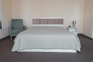 Postel nebo postele na pokoji v ubytování Hotel Class