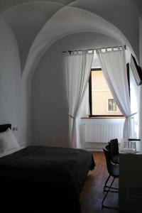 Voodi või voodid majutusasutuse Hotel im Stift Neuberg toas