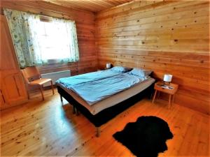 Krevet ili kreveti u jedinici u okviru objekta Old Pine Husky Lodge