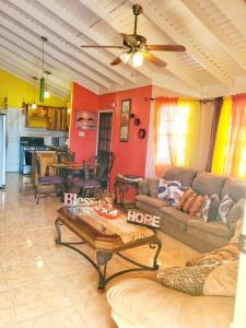 a living room with a couch and a table at Sensational 2 Bedroom Getaway in Florence Hall in The Rock