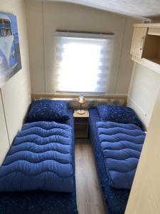 Postel nebo postele na pokoji v ubytování RBR 232 - Beach Resort Kamperland