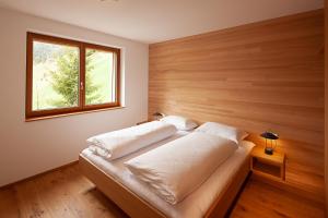 Postel nebo postele na pokoji v ubytování Sonnenhof Appartements