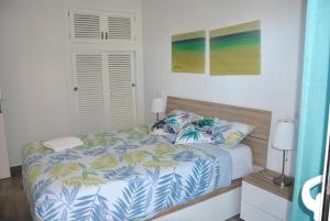 Postel nebo postele na pokoji v ubytování El Apartamento De Papá - Mil Palmeras + 25 fotografií
