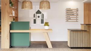 Cuisine ou kitchenette dans l'établissement Campanile Clermont Ferrand - Le Brezet