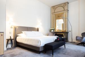 Postel nebo postele na pokoji v ubytování Villas Foch Boutique Hotel & Spa Bordeaux