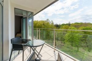 Balkon lub taras w obiekcie Apartament z aneksem kuchennym i basenem 426 Diune Hotel Resort