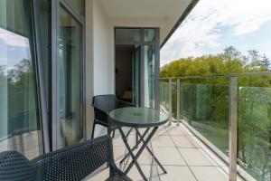 Balkon lub taras w obiekcie Apartament z aneksem kuchennym i basenem 426 Diune Hotel Resort