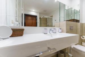 Łazienka w obiekcie Apartament z aneksem kuchennym i basenem 426 Diune Hotel Resort
