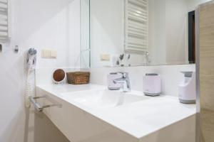 Łazienka w obiekcie Apartament z aneksem kuchennym i basenem 426 Diune Hotel Resort
