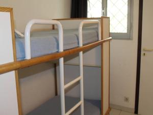 Poschodová posteľ alebo postele v izbe v ubytovaní Appartement 3P en RDJ avec Jardin, accès plage direct, 4 à 6 couchages - Villeneuve-Loubet Plage - FR-1-252A-73