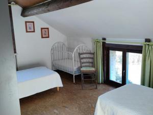 Posteľ alebo postele v izbe v ubytovaní Gîte familial spacieux avec jardin privatif, proche mer, équipements bébé, ping-pong, cheminée - FR-1-510-171