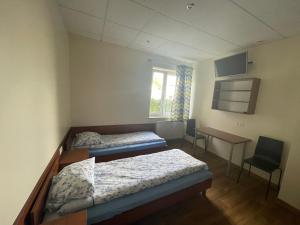 Postel nebo postele na pokoji v ubytování ANNA NOCLEGI