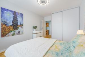 Łóżko lub łóżka w pokoju w obiekcie Apartament Doro
